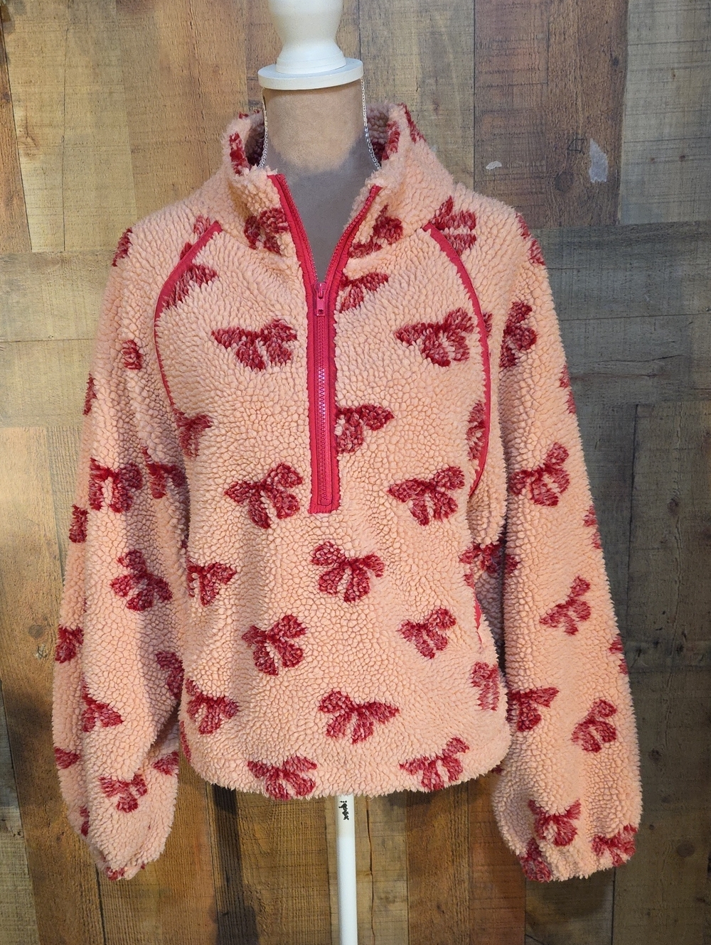 Cozy Pink Sherpa Pullover Hoodie with Red Bow Print